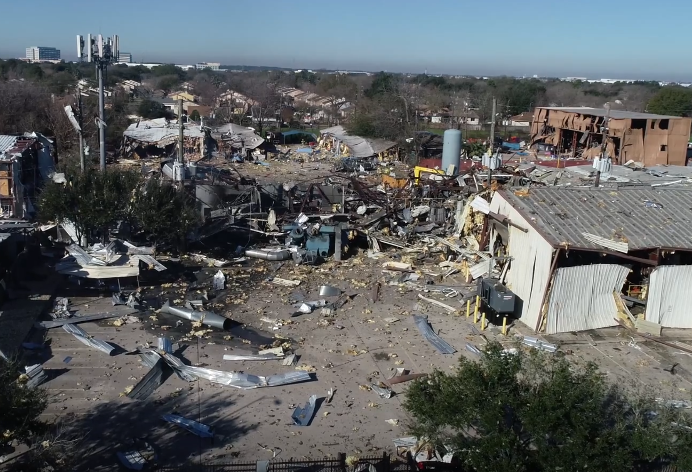 Front of Destroyed Building with Dust collector cell tower reference
