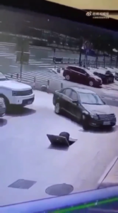 Car Drives Over Man Working is a Manhole