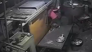 Man Crushed by CNC Machine (Graphic)