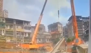 Crane Drops Beam at start of lift_crushes worker_GRAPHIC