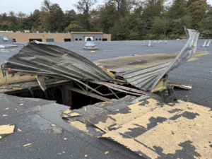 Hole in roof caused by tank failure, external view