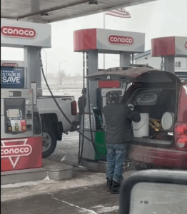 Splash filling a plastic 5-gallon bucket in winter time_Next Lottery Winner