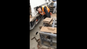 Dropped load traps workers by their arms_GRAPHIC